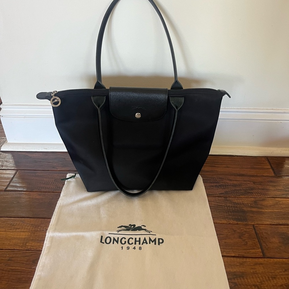 Longchamp  bag with leather details.